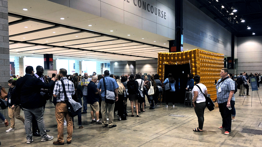 Starbucks baristas line up to engage with coffee growers around the world through Portals at the annual barista event.