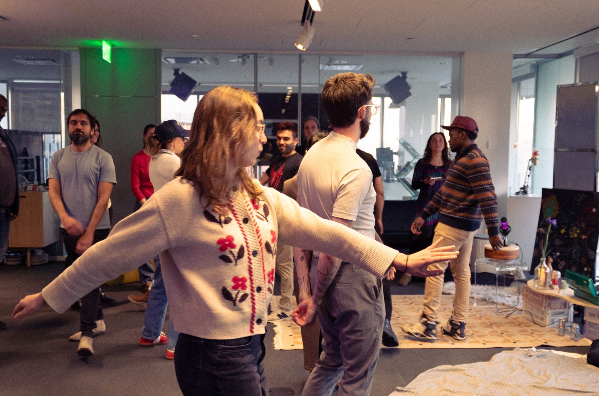Participants standing in a circle testing a new social form
